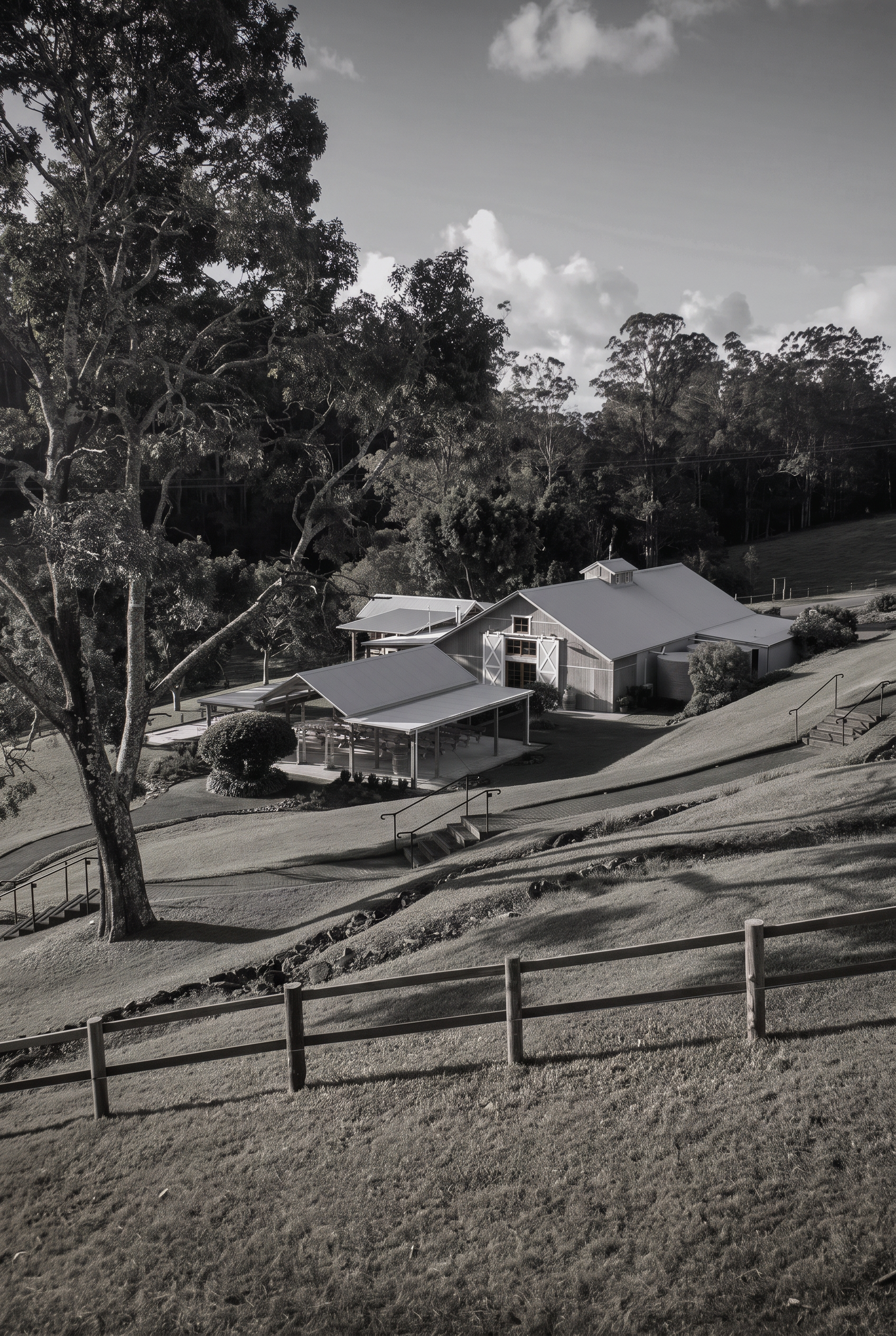 The venue surrounded by trees and rolling lawns